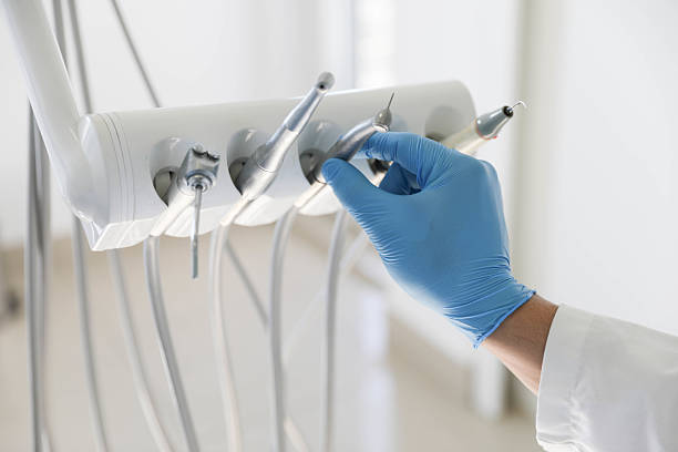 Professional Emergency Dentist technician working in Ames, TX